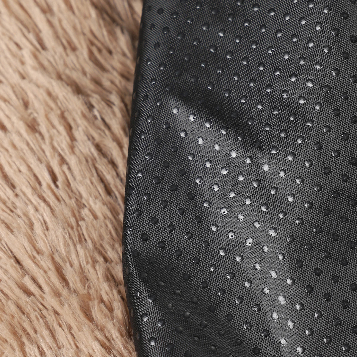 Close-up of the ImportAllied Fluffy Dog Bed fabric, showing soft, breathable material and cozy design for pets.